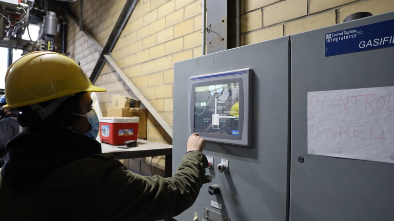 Sazzad Parveg works on a touchscreen at the Power Plant